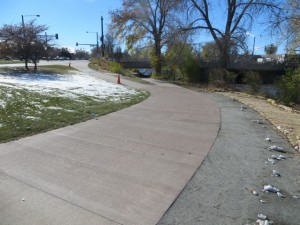  Looking south. This is the new bike path, 12 feet wide. Note the soft trail to the right for pedestrians. Top center, is where the new trail, meets the old trail and goes under the Evans bridge.     I'm trying to be objective here, but I can't. This is Killer..! What a great addition to the beautiful Overland Park neighborhood.